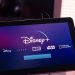 Barcelona, Spain. Jan 2019: Man holds a tablet with the new Disney plus on screen . Disney+ is an online video streaming subscription service.Illustrative